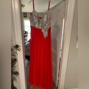 Red prom dress size 16. Beautiful red color with rhinestones and beaded top.